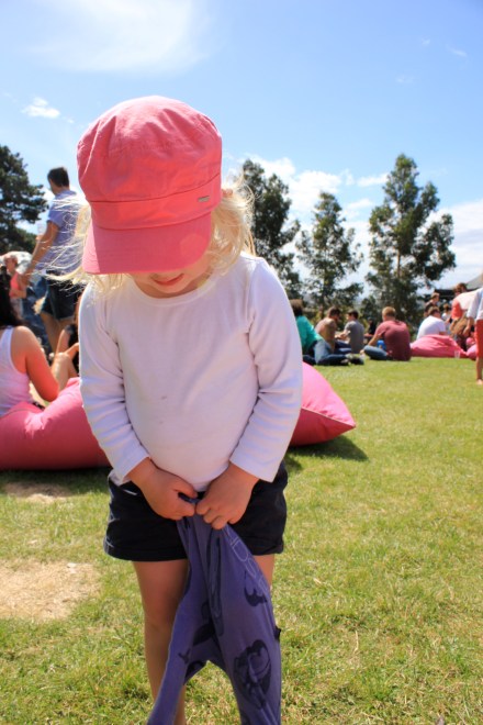 Pops trying to put her brother's pants on